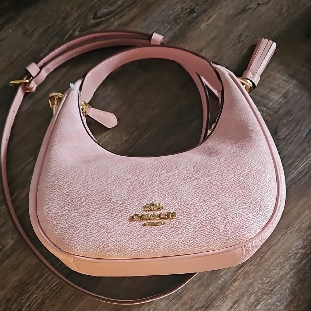 Coach Pink Crossbody Bag with Textured Elegance